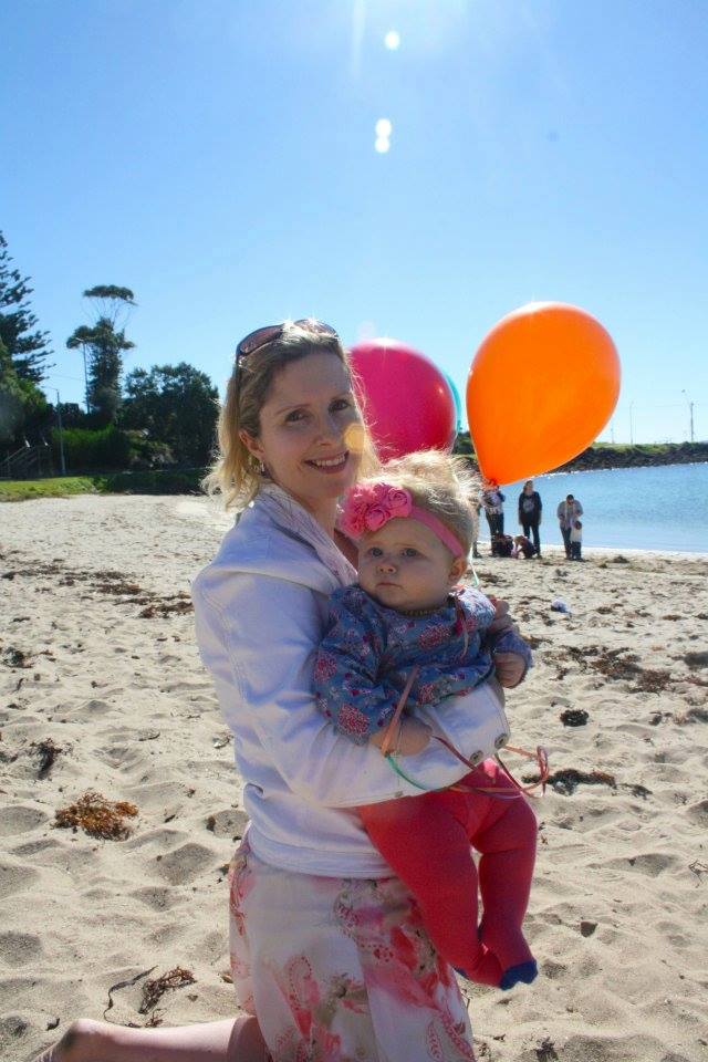 Cobie with her daughter Lucy at the balloon release they held one year after Joseph passed away.